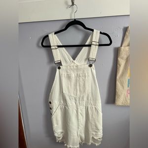 White short overalls.